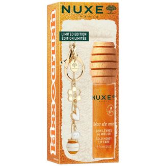 Zestaw Nuxe Reve De Miel, rozświetlający miodowy olejek do ust, 10 ml + etui z breloczkiem Zestaw Nuxe Reve De Miel, rozświetlający miodowy olejek do ust, 10 ml + etui z breloczkiem - zdjęcie produktu